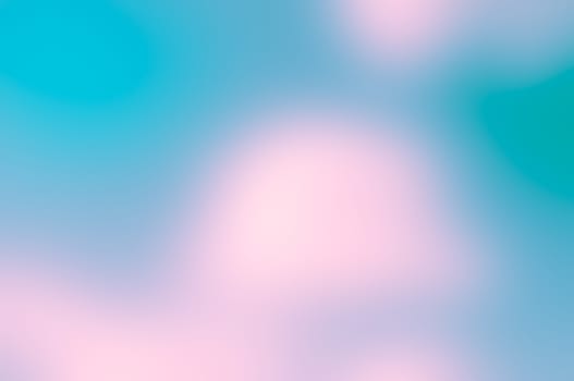 Abstract blue, green and pink blurred background