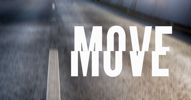 Photo of a gray street and the word MOVE in white and capital letters