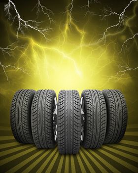 Wedge of new car wheels. Abstract yellow background with lightning and stripes at bottom