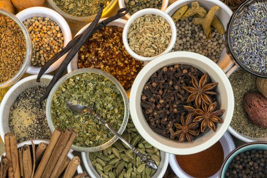 A selection of dried herbs and spices. Use in cooking to add seasoning and flavor to a meal.