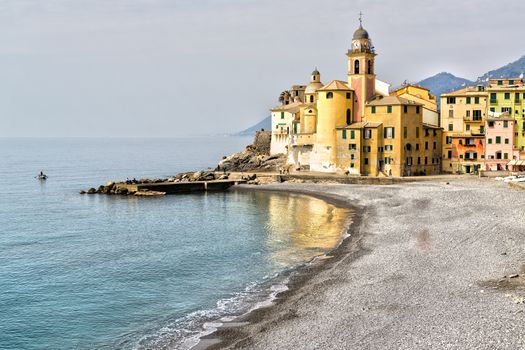 View on the promenade of Camogli in a spring cloudy morning