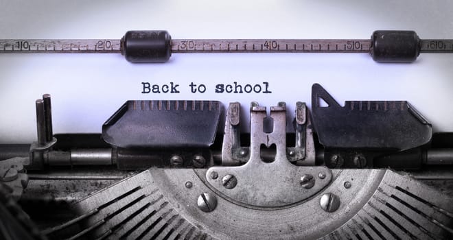 Vintage inscription made by old typewriter, back to school
