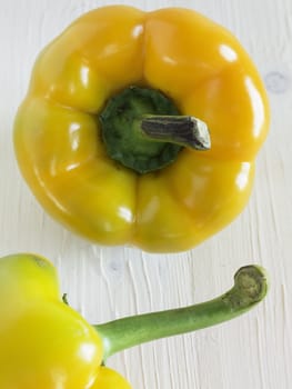 Two yellow peppers closeup