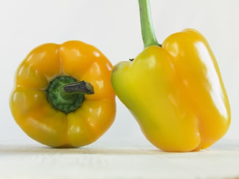 Two yellow peppers closeup