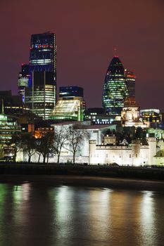 London city at the night time with the River Thames