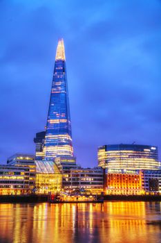 LONDON - APRIL 4: Overview of London with the Shard of Glass on April 4, 2015 in London, UK. Standing 306 metres high, the Shard is currently the tallest building in the European Union.