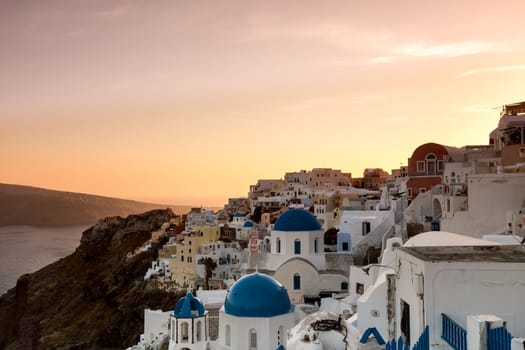 The sunset at Oia village in Santorini island in Greece