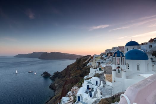 The sunset at Oia village in Santorini island in Greece