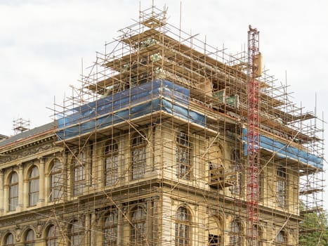 Fragment of scaffolding against house wall in Prague