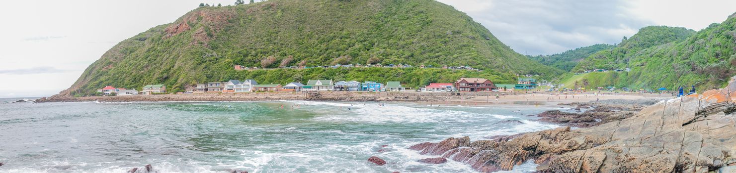 GEORGE, SOUTH AFRICA - JANUARY 4, 2015: Unidentified people, holiday homes and a caravan park at the beach at Victoria Bay