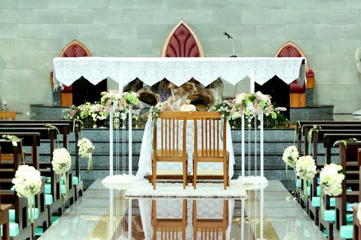 Table set for bride and groom in church