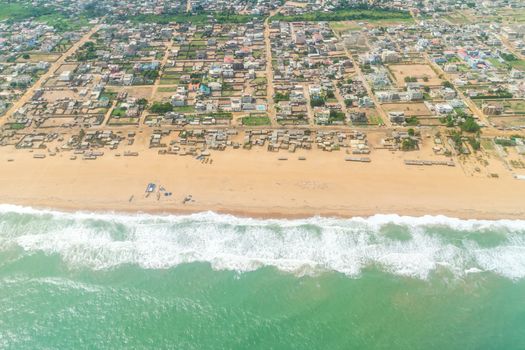 Aerial view of the Atlantic Ocean coastline along the shores of Cotonou, Benin