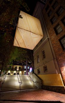 SYDNEY, AUSTRALIA - MAY 26, 2015;  Legacy of Landscape is a huge suspended light made of sandstone and a warm glow emanates from within, conjuring an image of a campfire in a cave. Artist Peter Langford