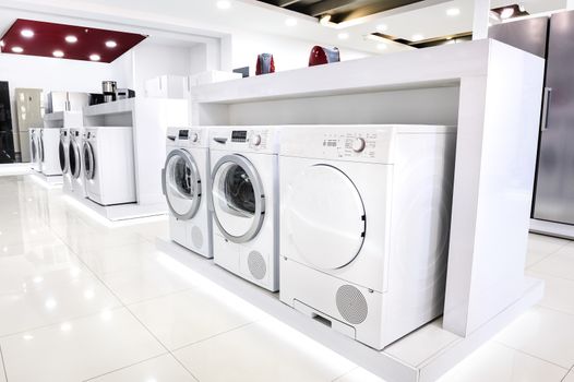 Washing machines, dryer and other domestic appliance equipment in the store