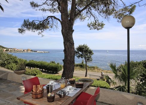 table for a breakfast on the sea