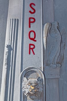 roman symbol on lamppost
