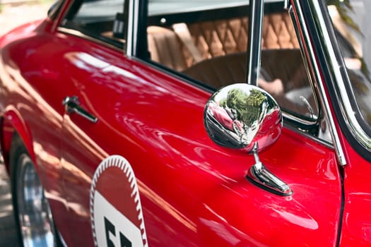 JUNE 19 2015 - ROME, ITALY detail of old red car