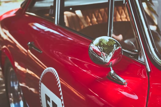 JUNE 19 2015 - ROME, ITALY detail of old red car