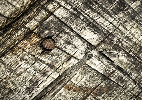 background or texture Old wooden board with nail