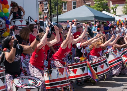 Nyack, NY, USA - June 14, 2015: Members of Batala NYC performing on and before the stage during Rockland County Pride.