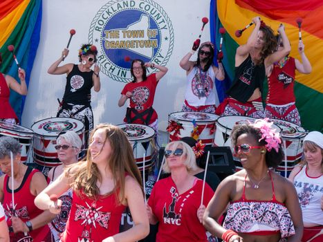 Nyack, NY, USA - June 14, 2015: Members of Batala NYC performing on and before the stage during Rockland County Pride.