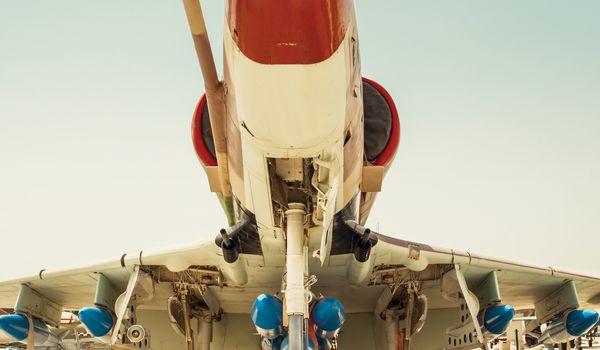 Cluster of bombs mounted under the wing of a fighter aircraft