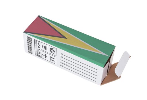 Concept of export, opened paper box - Product of Guyana