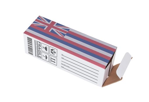 Concept of export, opened paper box - Product of Hawaii