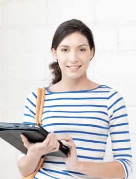 education and technology concept - picture of happy teenage girl with tablet pc computer