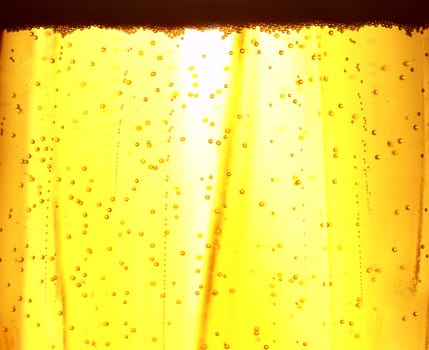 Alcohol conceptual image. Beer golden background.