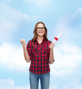 university and education concept - smiling female student in eyeglasses with diploma