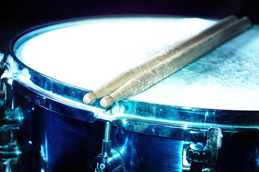 Drums conceptual image. Snare drum and stick.