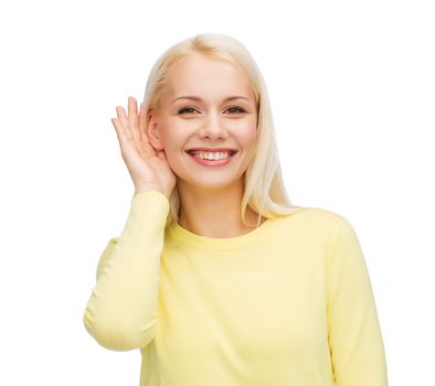 gossip, communication and people concept - smiling young woman listening to gossip