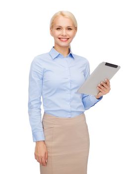 business, internet and technology concept - smiling woman looking at tablet pc computer