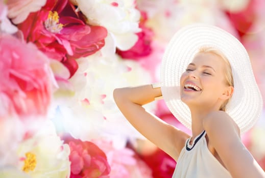 fashion, happiness and lifestyle concept - beautiful woman in hat enjoying summer outdoors