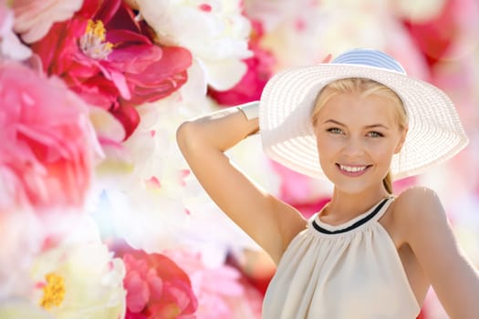 fashion, happiness and lifestyle concept - beautiful woman in hat enjoying summer outdoors