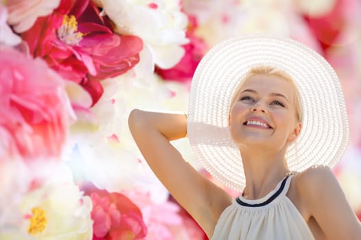 fashion, happiness and lifestyle concept - beautiful woman in hat enjoying summer outdoors