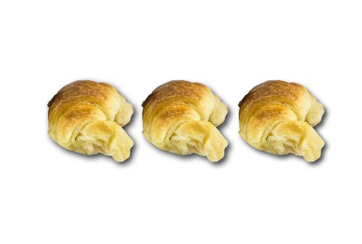 Three croissants isolated on white background