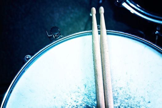 Drums conceptual image. Snare drum and stick.