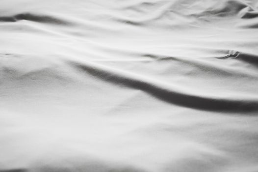 White bedding backgroud. Black and white picture.