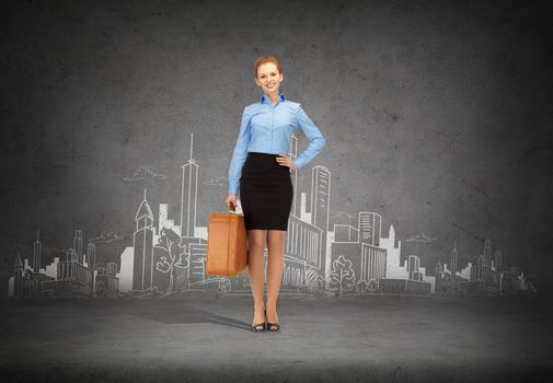 office, travel and business concept - smiling businesswoman with suitcase