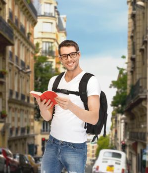 travel, vacation and education concept - travelling student with backpack and book