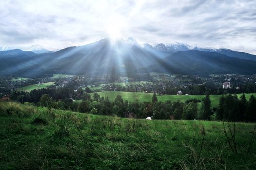 Clouds over Tatra mountains and Zakopane city. Nature Landscape.