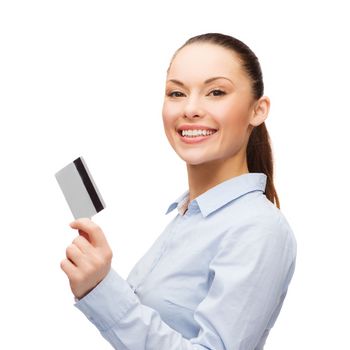 business and bank concept - smiling businesswoman showing credit card