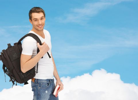 travel, vacation and education concept - travelling student with backpack and book