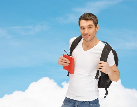 travel, vacation and education concept - travelling student with backpack and book