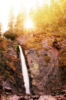 Waterfall in mountains. Nature conceptual image.