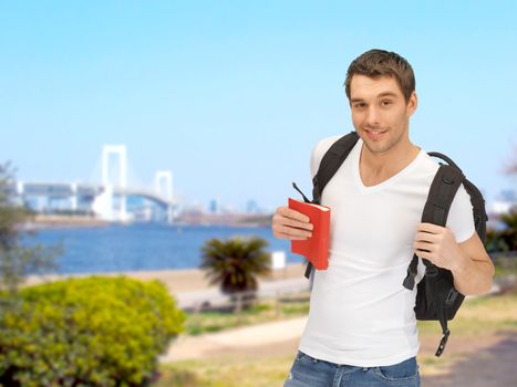 travel, vacation and education concept - travelling student with backpack and book