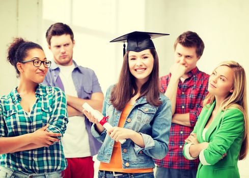 education and competition concept - girl in graduation cap with certificate and students