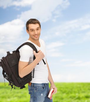 travel, vacation and education concept - travelling student with backpack and book